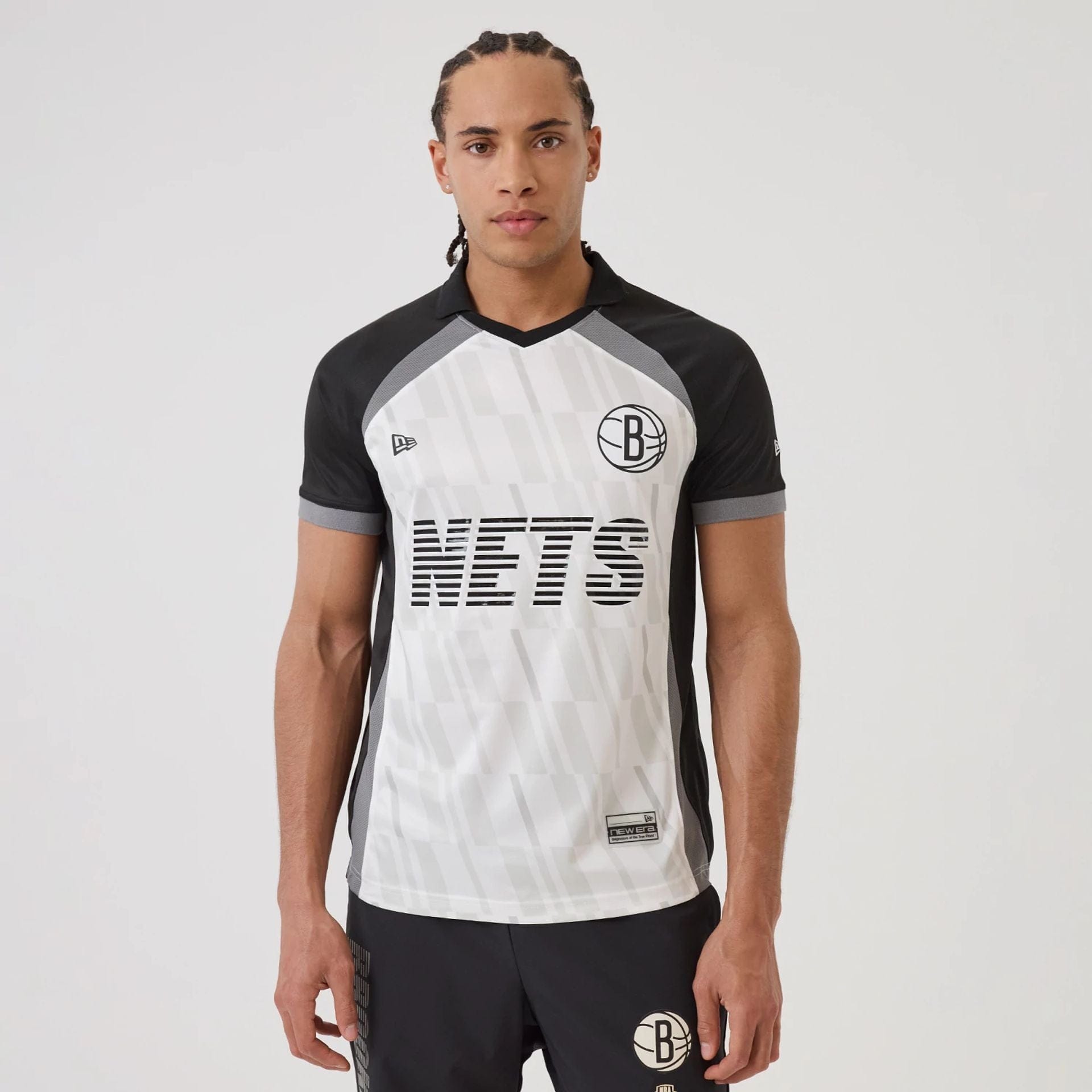 The model is wearing this NBA Match Brooklyn Nets T-Shirt in black. 1