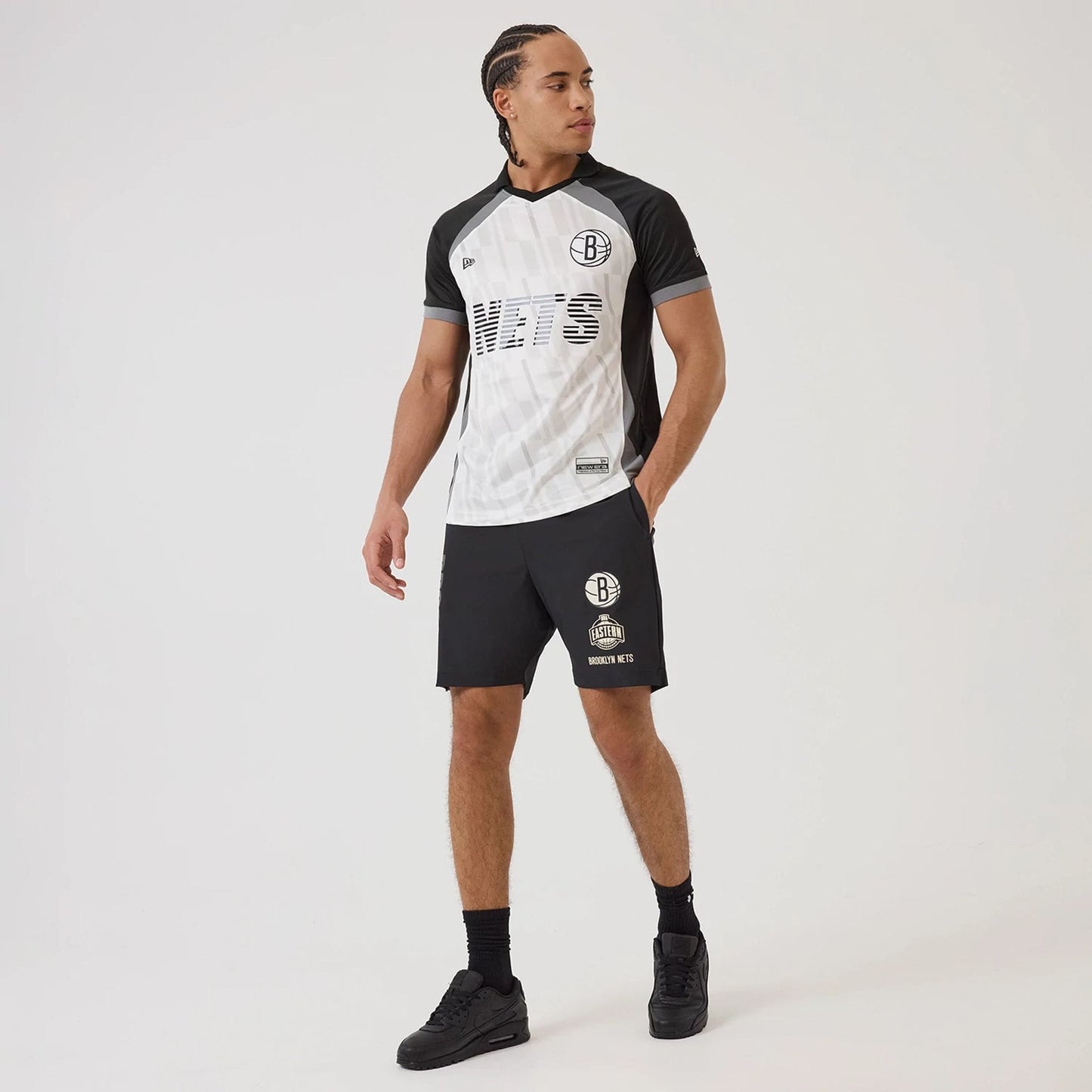 The model is wearing this NBA Match Brooklyn Nets T-Shirt in black. 8