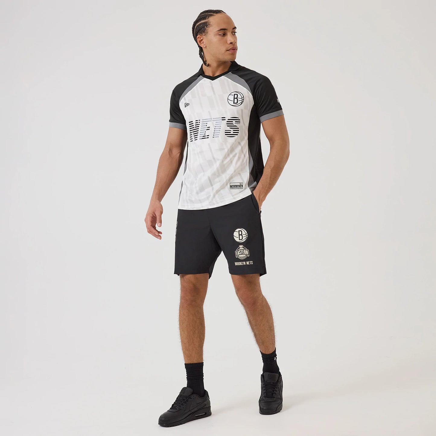 The model is wearing this NBA Match Brooklyn Nets T-Shirt in black. 8