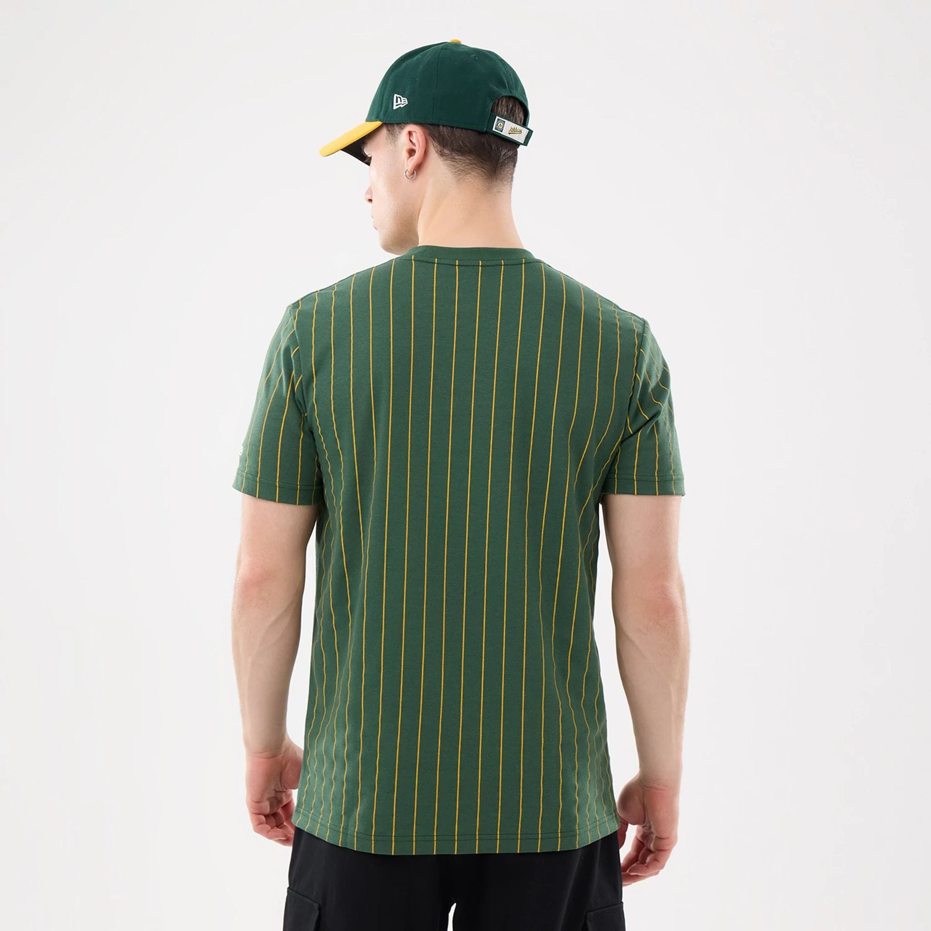 The model is wearing this MLB Pinstripe Athletics T-Shirt in dark green. 2