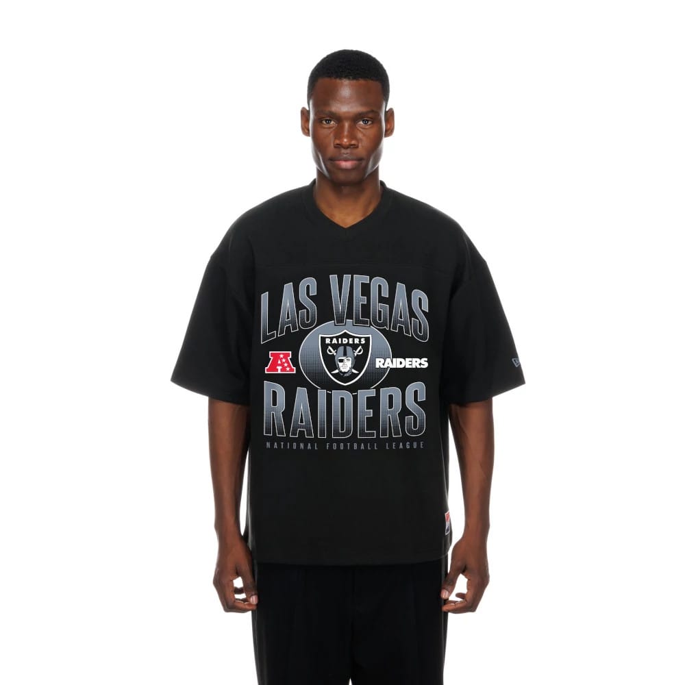The model is wearing this NFL Las Vegas Raiders Boxy T-Shirt in black. 1