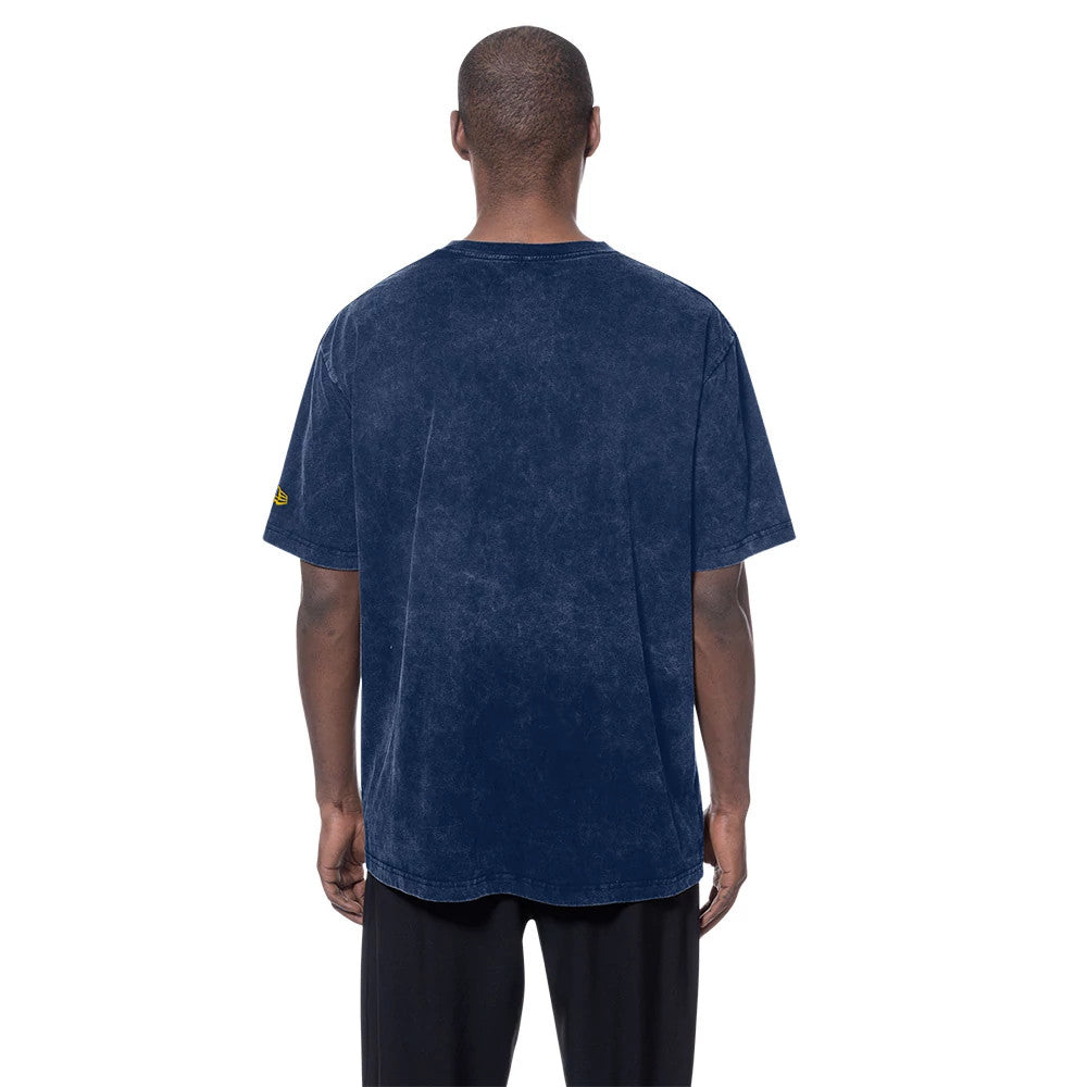 New Era Indiana Pacers NBA Anniversary Navy T-Shirt, back view showing a plain navy design with no graphics, short sleeves, and a relaxed fit on a model, with a small logo on the upper-left sleeve.