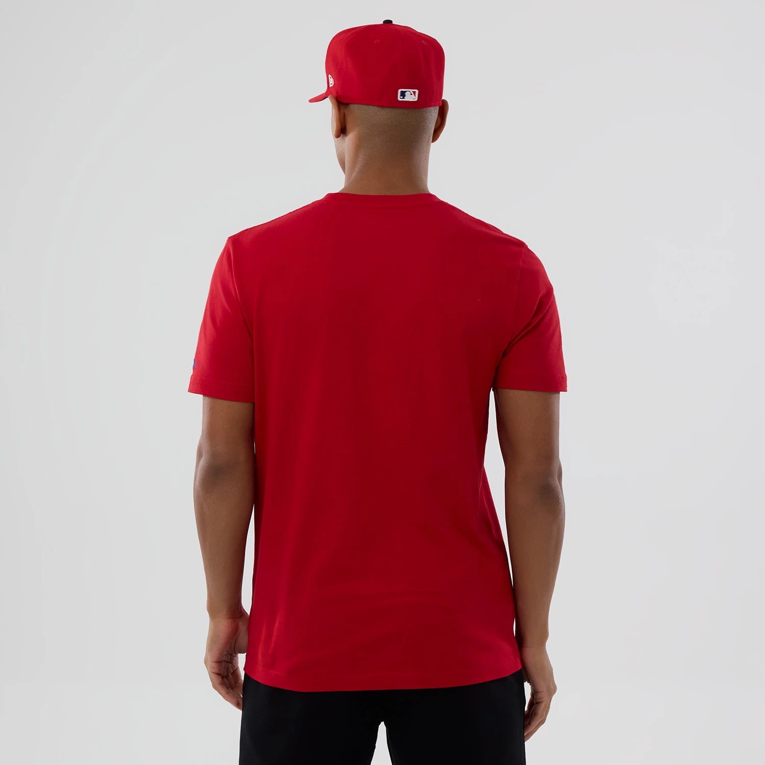 The model is wearing this MLB Popcorn Philadelphia Phillies T-Shirt in red. 2