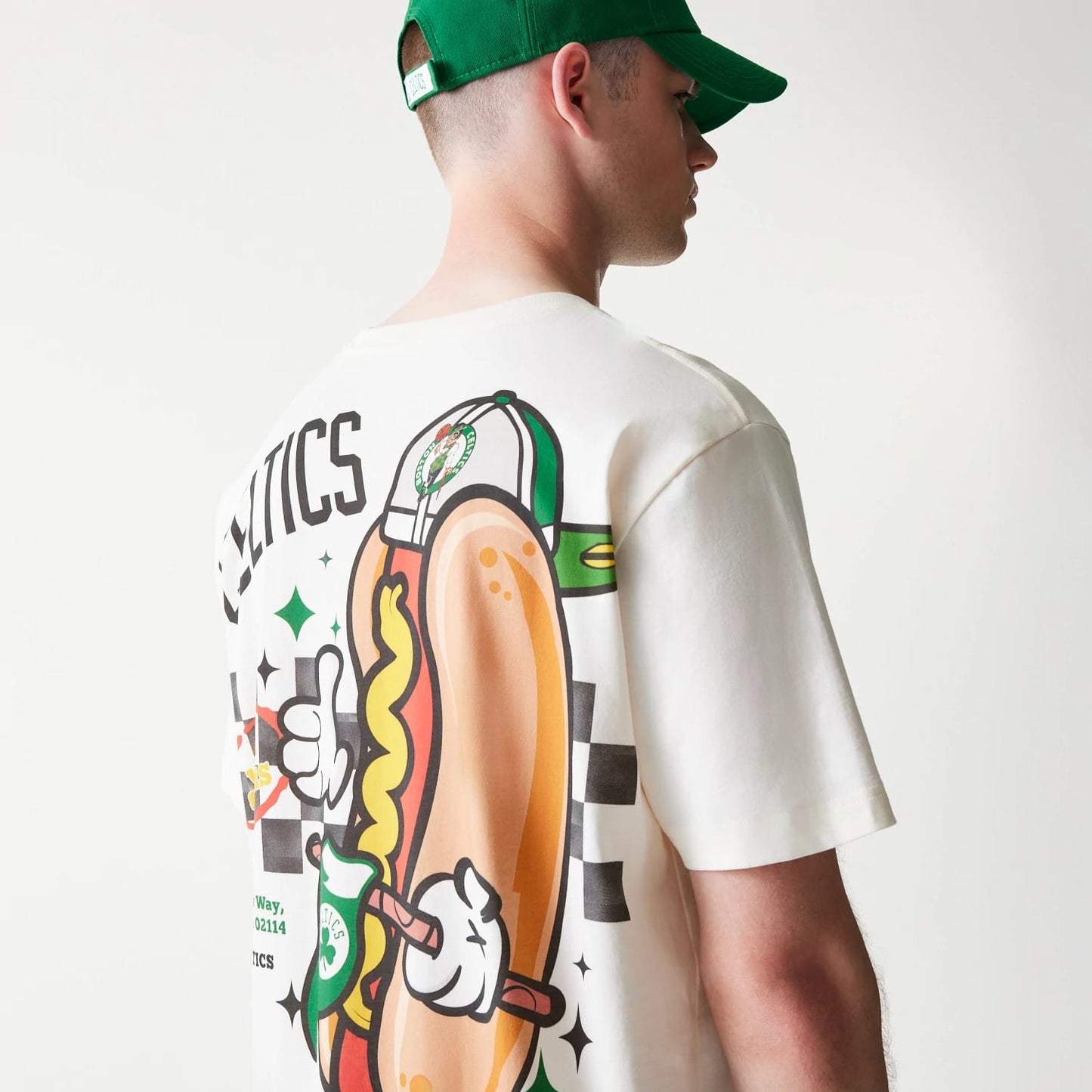 The model is wearing this NBA Hotdog Boston Celtics T-Shirt in cream. 6