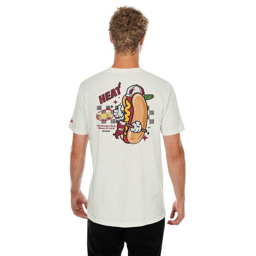 New Era Miami Heat NBA Hotdog Cream T-Shirt, back view on a model showing a cartoon graphic of a hotdog with drinks and the word HEAT above, alongside detailed checkerboard patterns and a New Era logo on the sleeve.