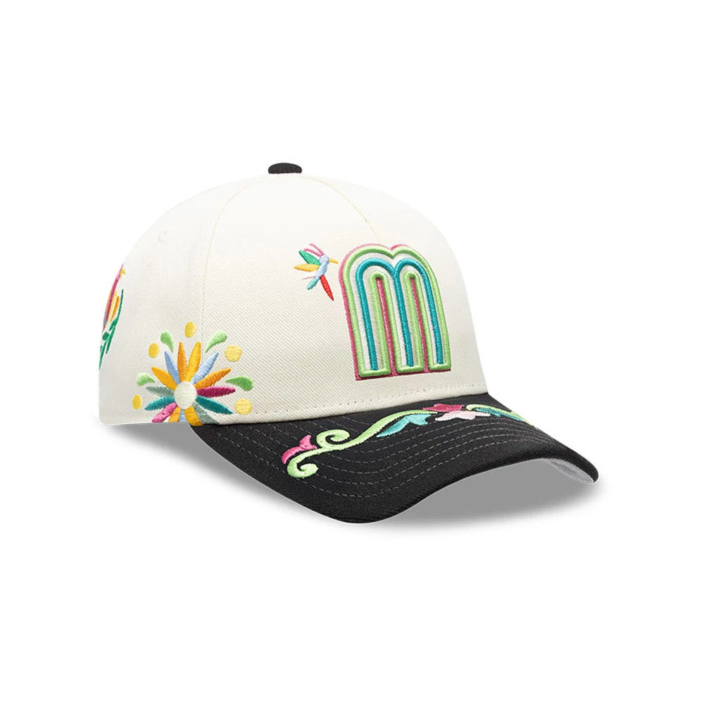 Mexico WBC Latin Embroidery White New Era 9FORTY M-Crown A-Frame Adjustable Cap, three-quarter view showing the colourful M logo on the front panel, floral embroidery on the sides, and decorative embroidery on the black curved visor.