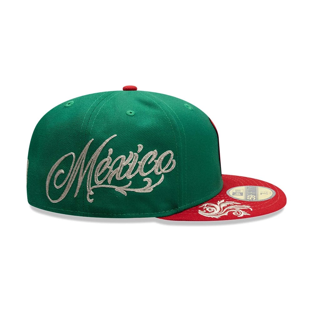 Mexico LMB Wordmark Green New Era 59FIFTY Fitted Cap, side view showing the silver embroidered México wordmark on the green structured crown, with an elaborate white embroidery on the red flat visor and gold 59FIFTY size sticker.