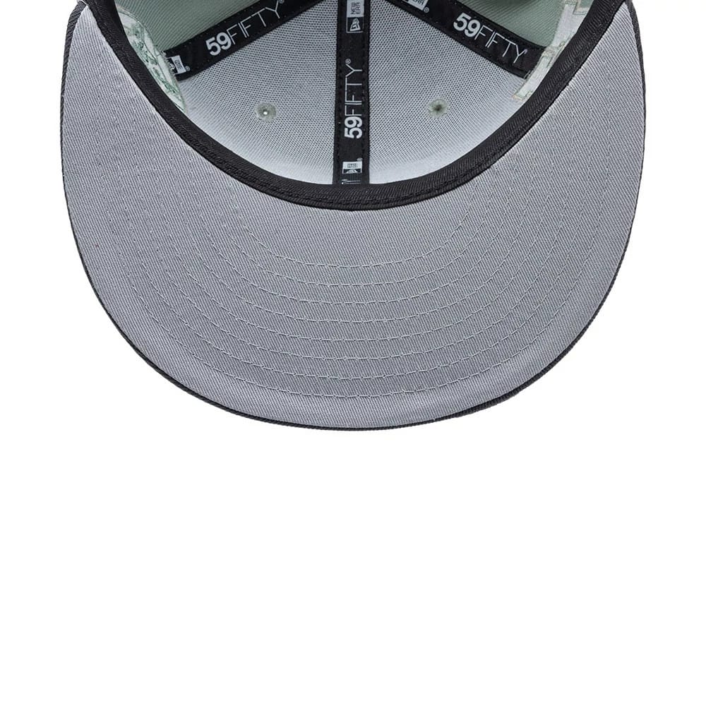 Pictured is this Liga MX Pumas Unam 59FIFTY Fitted cap in pastel green. 2