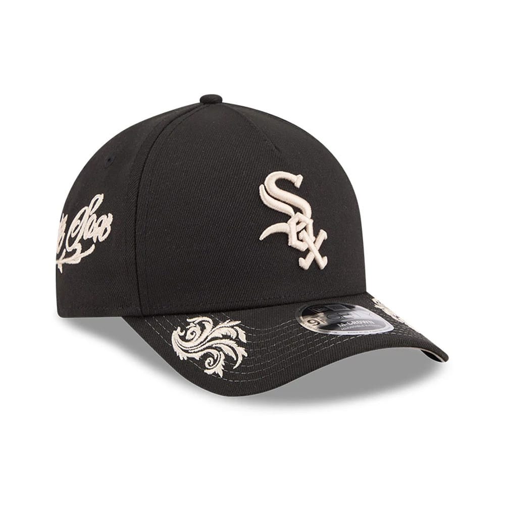 Chicago White Sox MLB Script Black New Era 9FORTY M-Crown A-Frame Adjustable Cap, three-quarter view showing the beige embroidered White Sox logo on the front panel, ornate visor pattern, and 9FORTY size sticker.