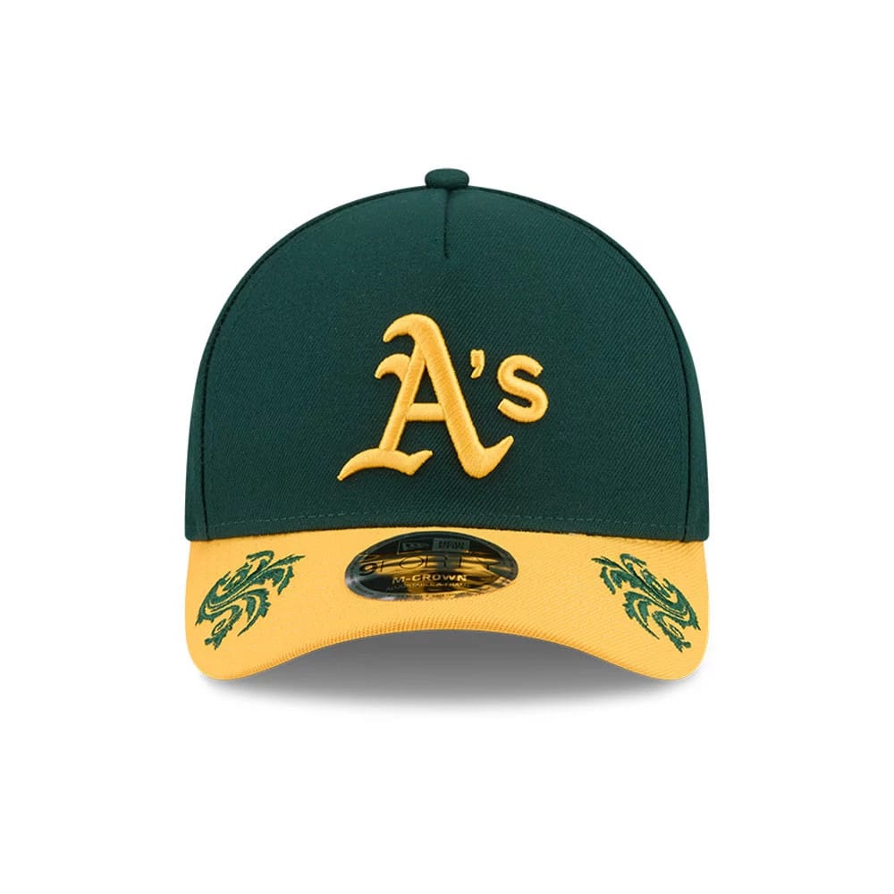 Athletics MLB Script Dark Green New Era 9FORTY M-Crown A-Frame Adjustable Cap, front view showing the yellow raised embroidered A's logo on the dark green crown, with gold visor featuring green embroidered designs and 9FORTY size sticker.