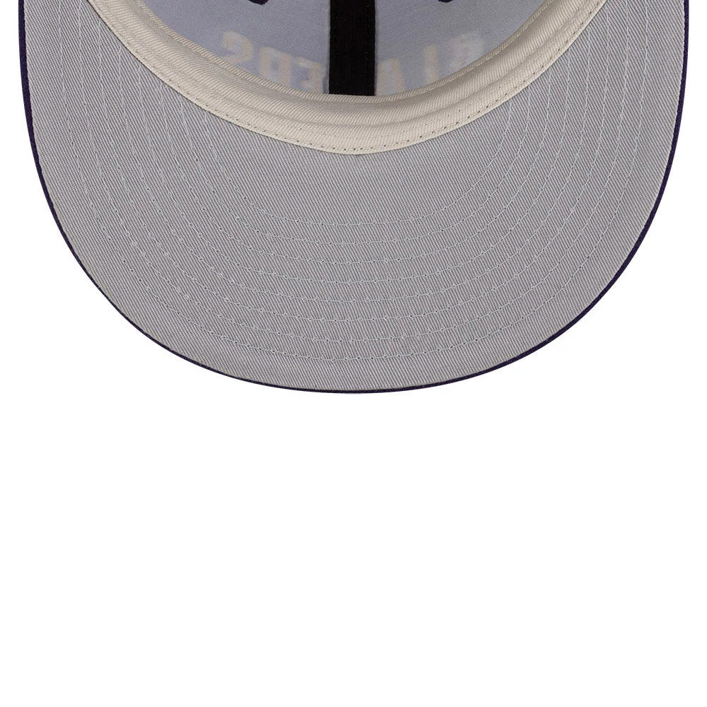 LA Lakers FOG x NBA Dark Purple Retro Crown New Era 9FIFTY Adjustable Cap, inside view showing a grey undervisor with matching taping and a black sweatband, accented with faint text on the underside of the fabric.