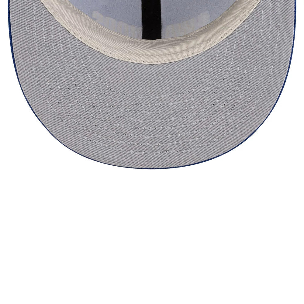 Golden State Warriors FOG x NBA Blue Retro Crown New Era 9FIFTY Adjustable Cap, inside view showing the light grey undervisor and black internal taping, with a white sweatband encircling the base.