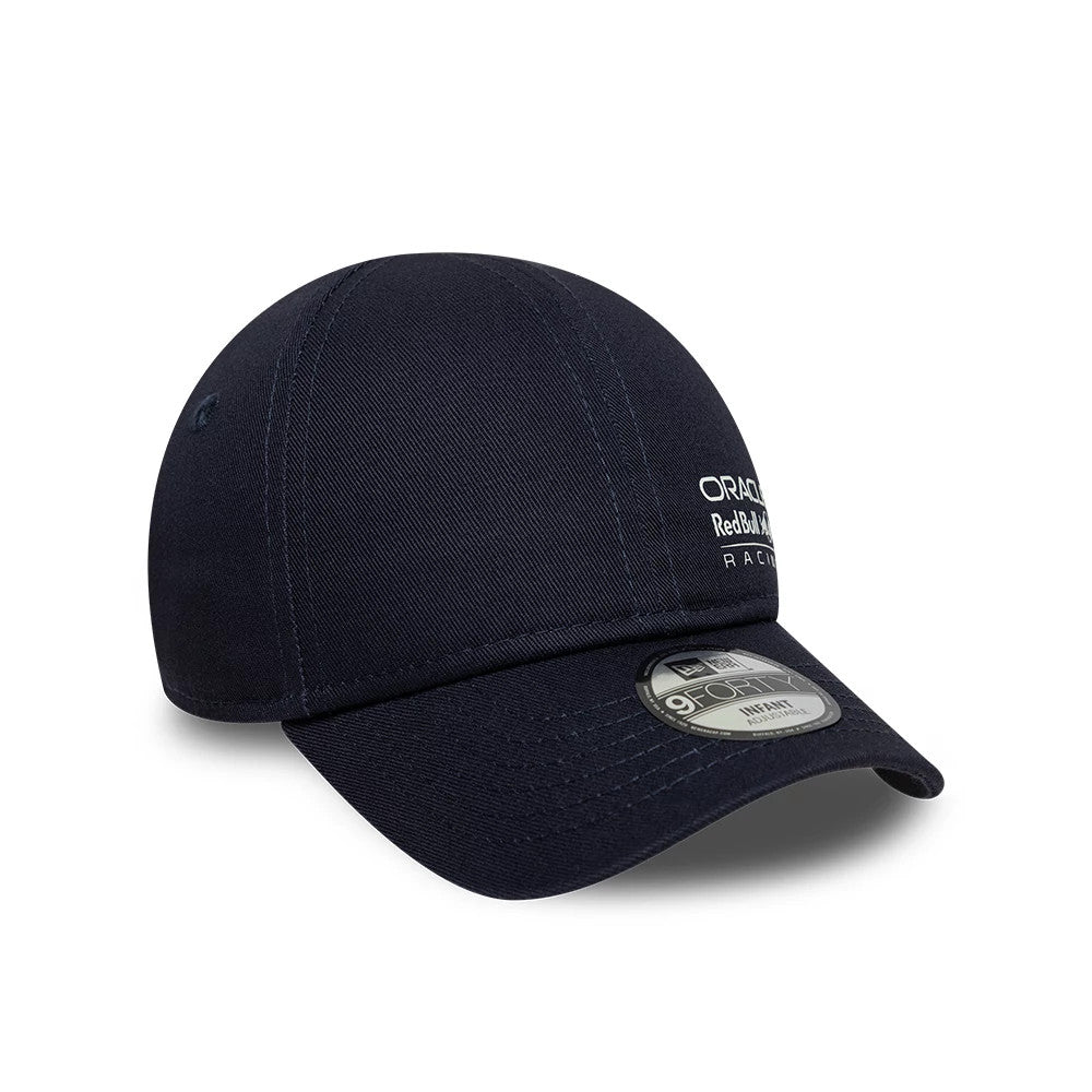 Red Bull Racing Infant My 1st Knit Dark Blue New Era 9FORTY Adjustable Cap, three-quarter view showing raised white embroidered text on the front left panel, dark blue curved visor and 9FORTY size sticker on top.