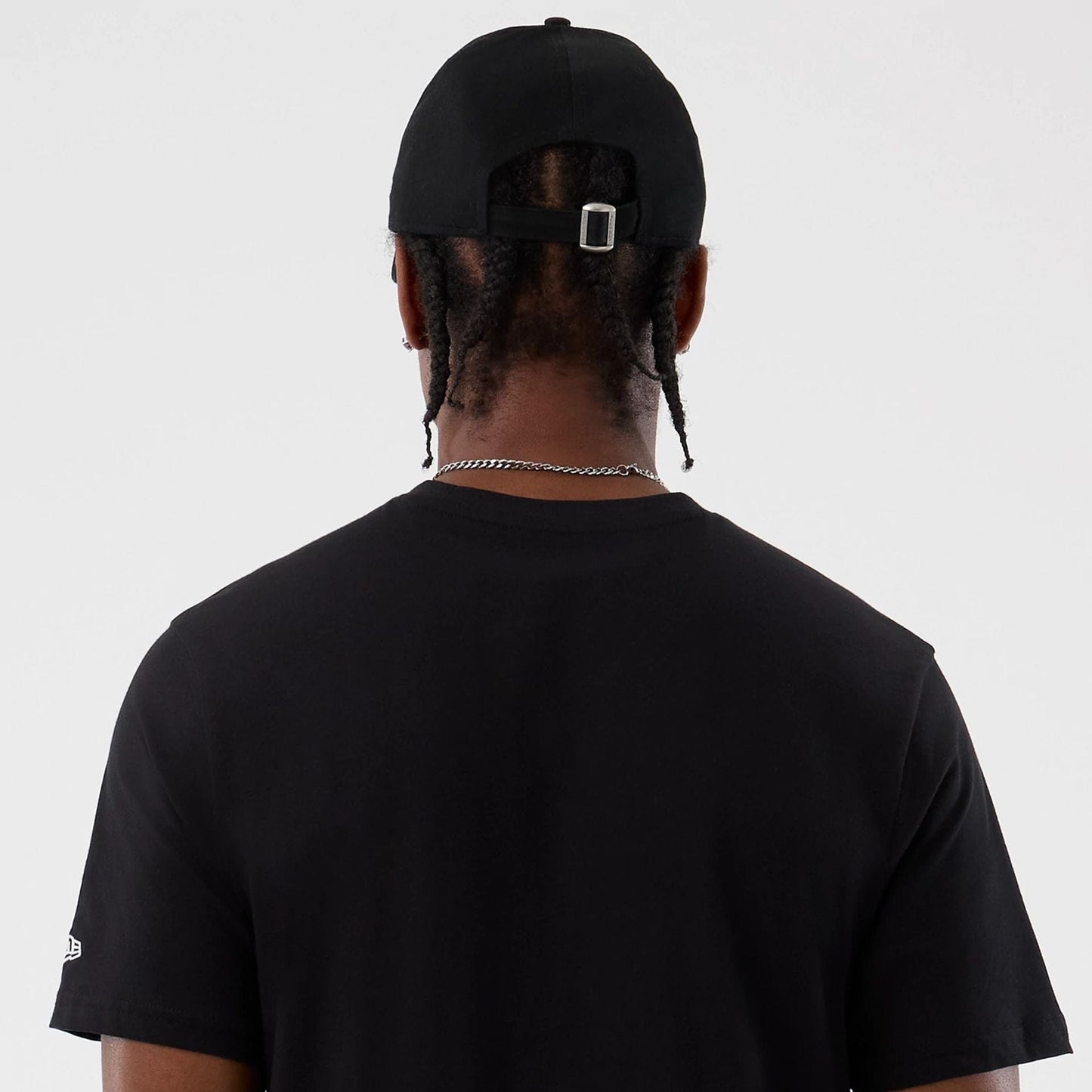 The Male model is wearing New Era Back To School Black T-Shirt 7