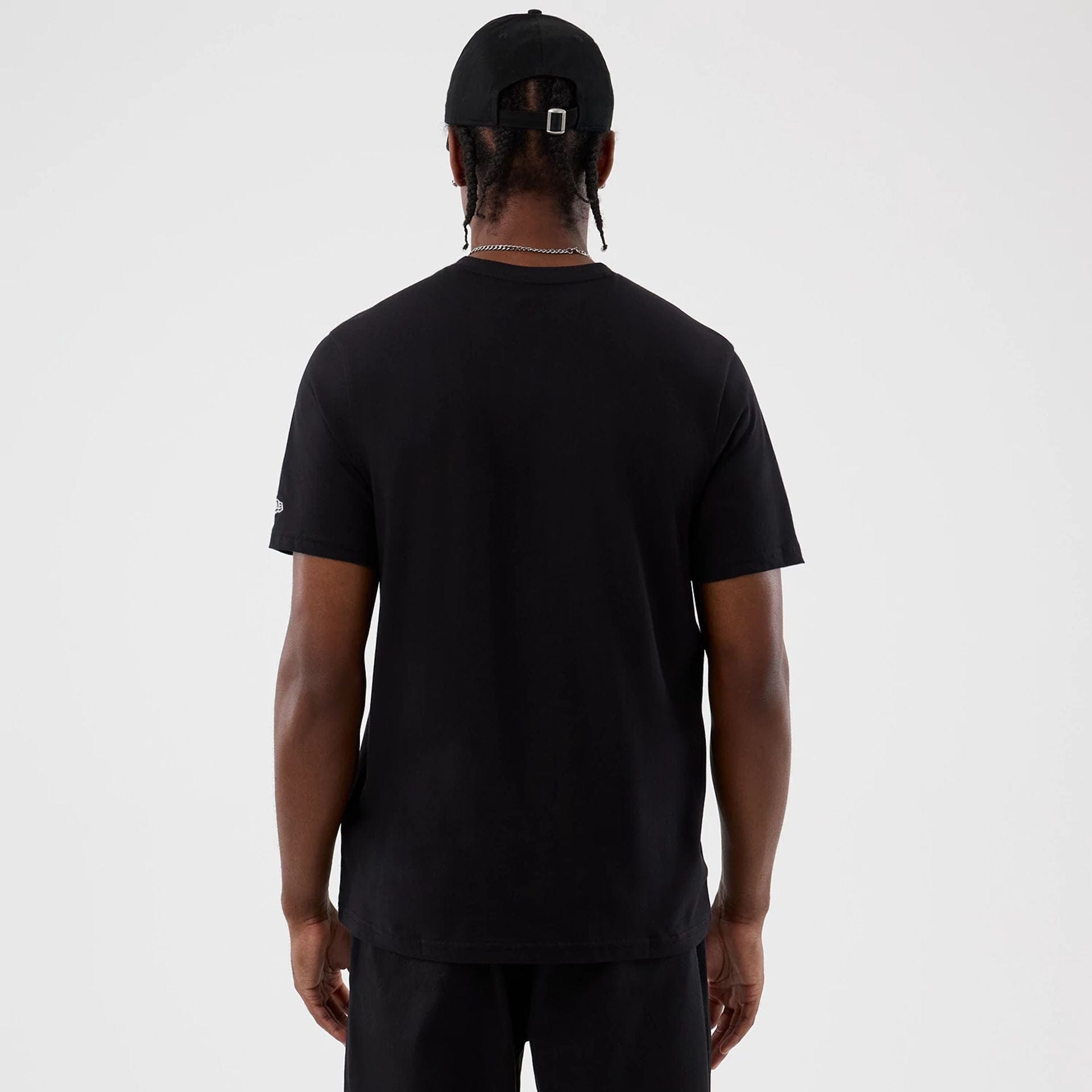 The Male model is wearing New Era Back To School Black T-Shirt 2