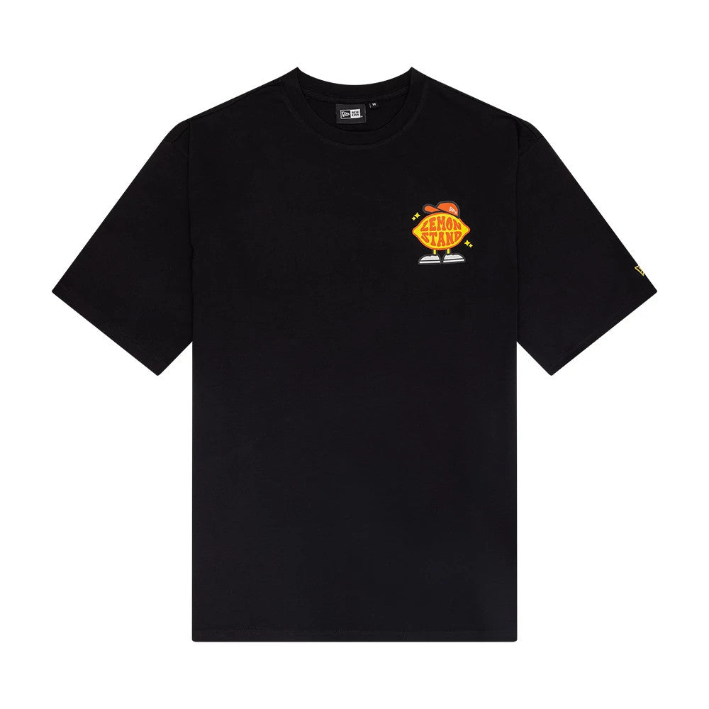 New Era Summer Graphic Black Oversized T-Shirt, front view showing a brightly coloured Lemon Stand graphic with a cap design on the left chest and a printed New Era logo on the left sleeve.