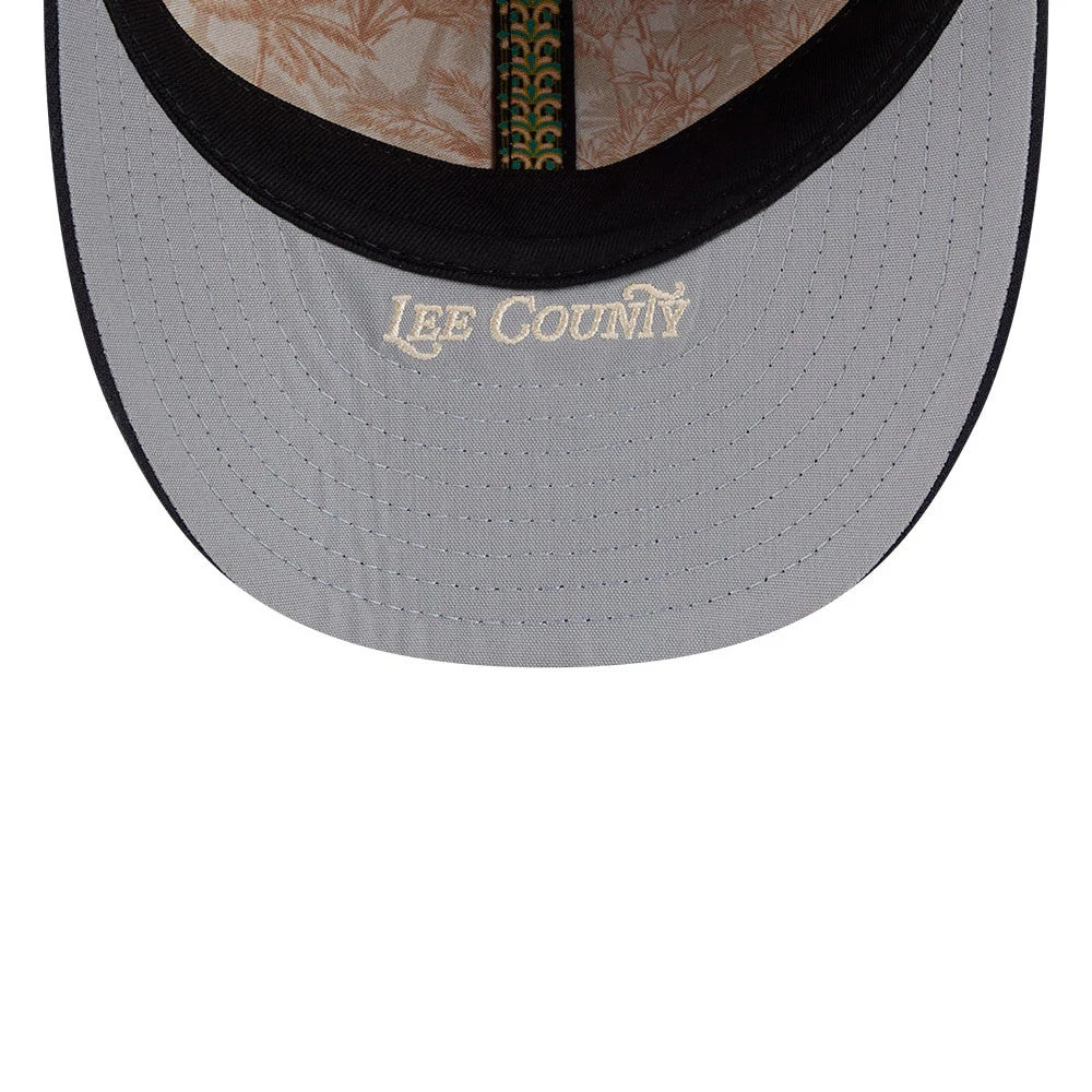 Boston Red Sox MLB Spring Training 2026 Red Low Profile New Era 59FIFTY Fitted Cap, inside view showing the grey undervisor with Lee County embroidery, floral patterned taping, and black sweatband.