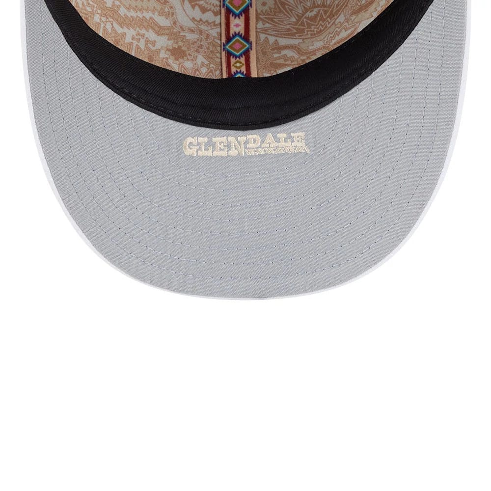 White Sox MLB Spring Training 2026 Black Low Profile New Era 59FIFTY Fitted Cap, inside view showing the grey undervisor with the word Glendale embroidered in white, patterned taping, and intricate beige lining.