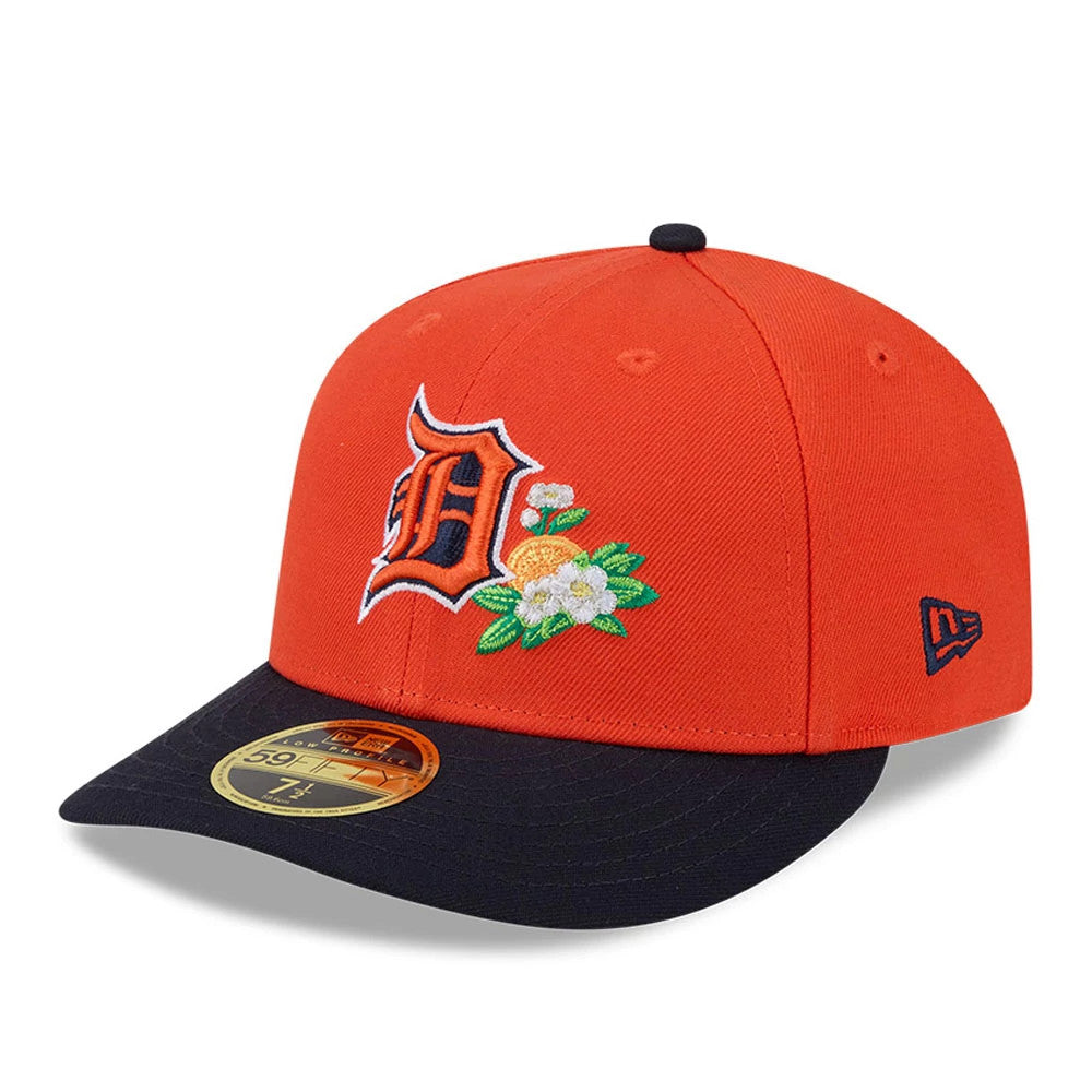 Detroit Tigers MLB Spring Training 2026 Red Low Profile New Era 59FIFTY Fitted Cap, front view showing the embroidered orange and white Detroit Tigers logo and floral design on the red crown, with a navy visor and gold 59FIFTY size sticker.
