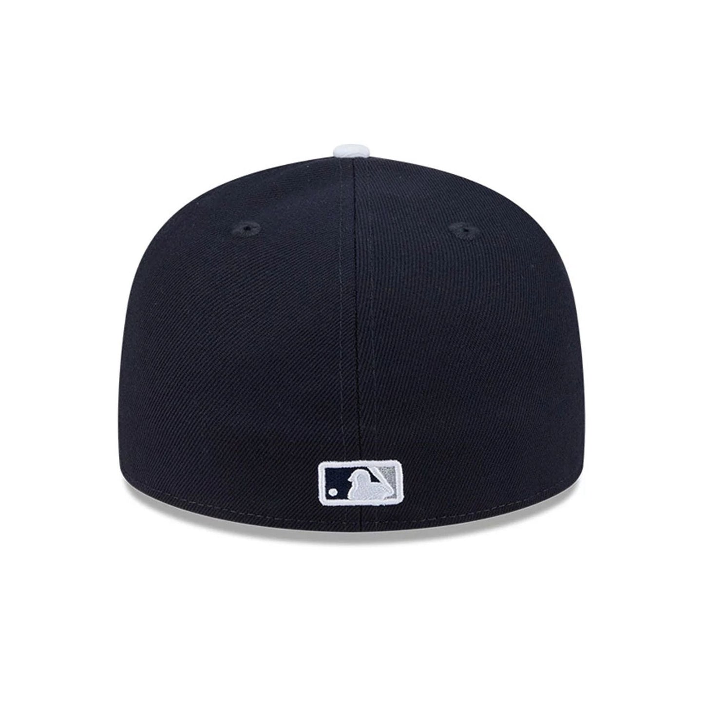 Yankees MLB Spring Training 2026 Navy Low Profile New Era 59FIFTY Fitted Cap, rear view showing the white embroidered MLB Batterman logo centred at the back of the navy crown, with matching eyelets and top button detail.