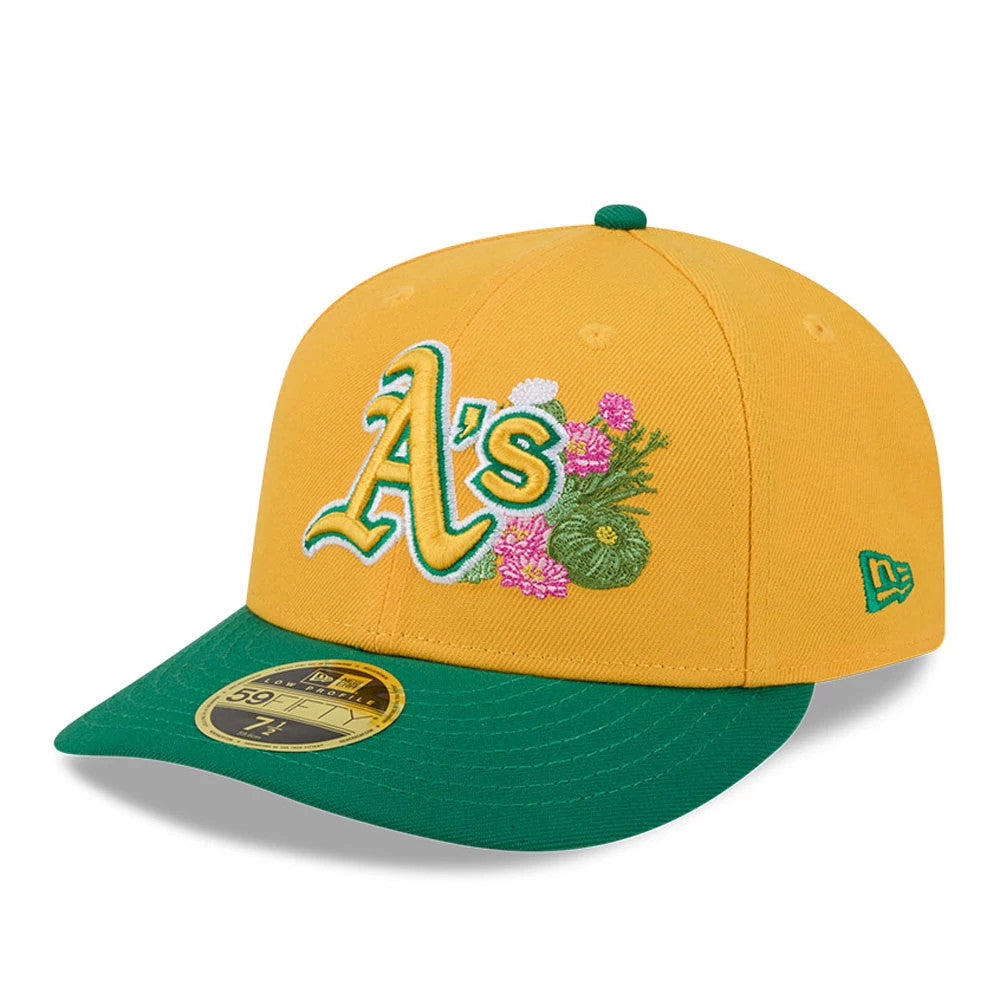 Athletics MLB Spring Training 2026 Yellow Low Profile New Era 59FIFTY Fitted Cap, three-quarter view showing a raised yellow and green A's logo with floral embroidery on the front panel, green visor and New Era flag logo on the left side.