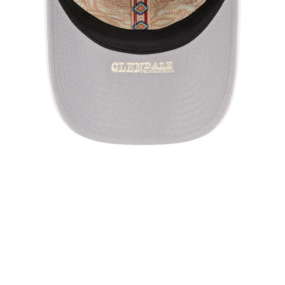 LA Dodgers MLB Spring Training 2026 Dark Blue New Era Casual Classic Adjustable Cap, inside view showing the grey undervisor with Glendale embroidery, a patterned taping in red and blue, and a black sweatband.