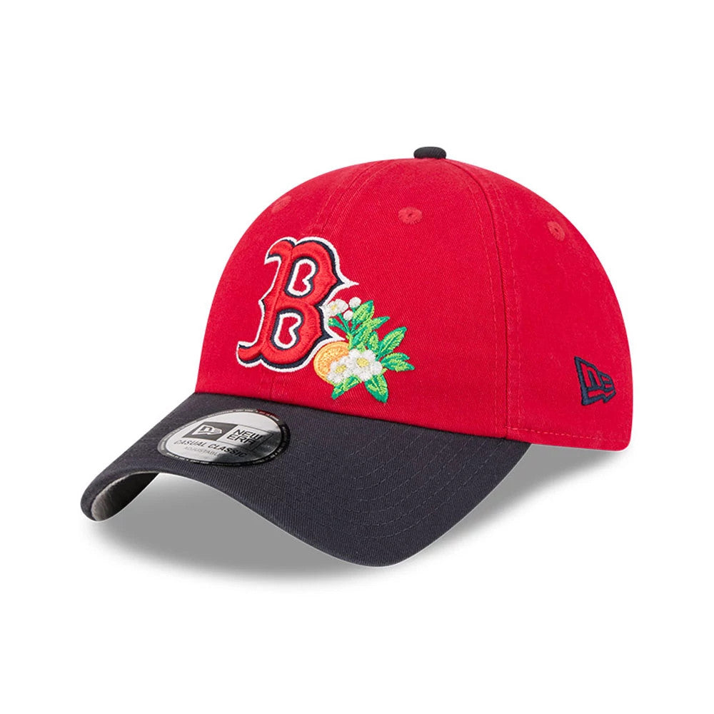 New Era Boston Red Sox MLB Spring Training 2026 Red Casual Classic Adjustable Cap, three-quarter view showing a floral embroidered Red Sox B logo on the red crown, dark visor, and the New Era flag logo on the left side.
