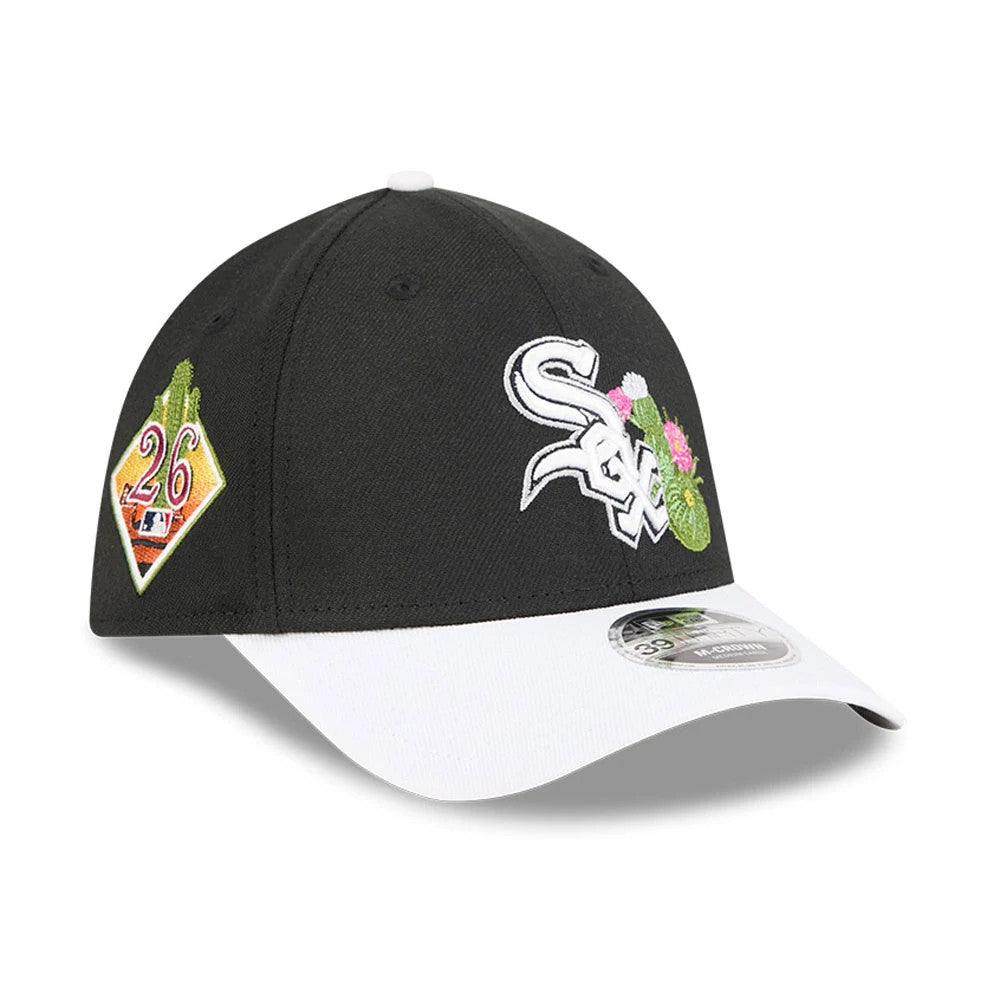 White Sox MLB Spring Training 2026 Black New Era 39THIRTY M-Crown Stretch Fit Cap, three-quarter view showing the embroidered white Sox logo with cactus and floral detail on the front panel, a 26 patch on the side.