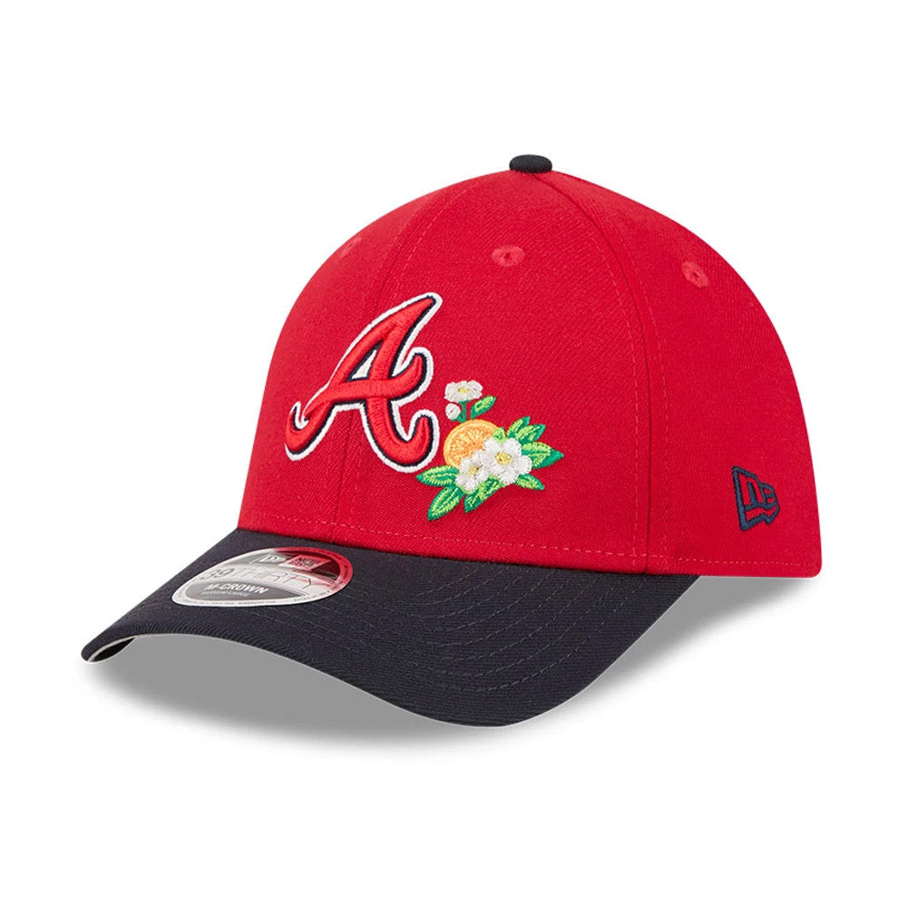 Atlanta Braves MLB Spring Training 2026 Red New Era 39THIRTY M-Crown Stretch Fit Cap, three-quarter view showing the raised red and white A logo and floral embroidery on the front, with a black curved visor and 39THIRTY size sticker.