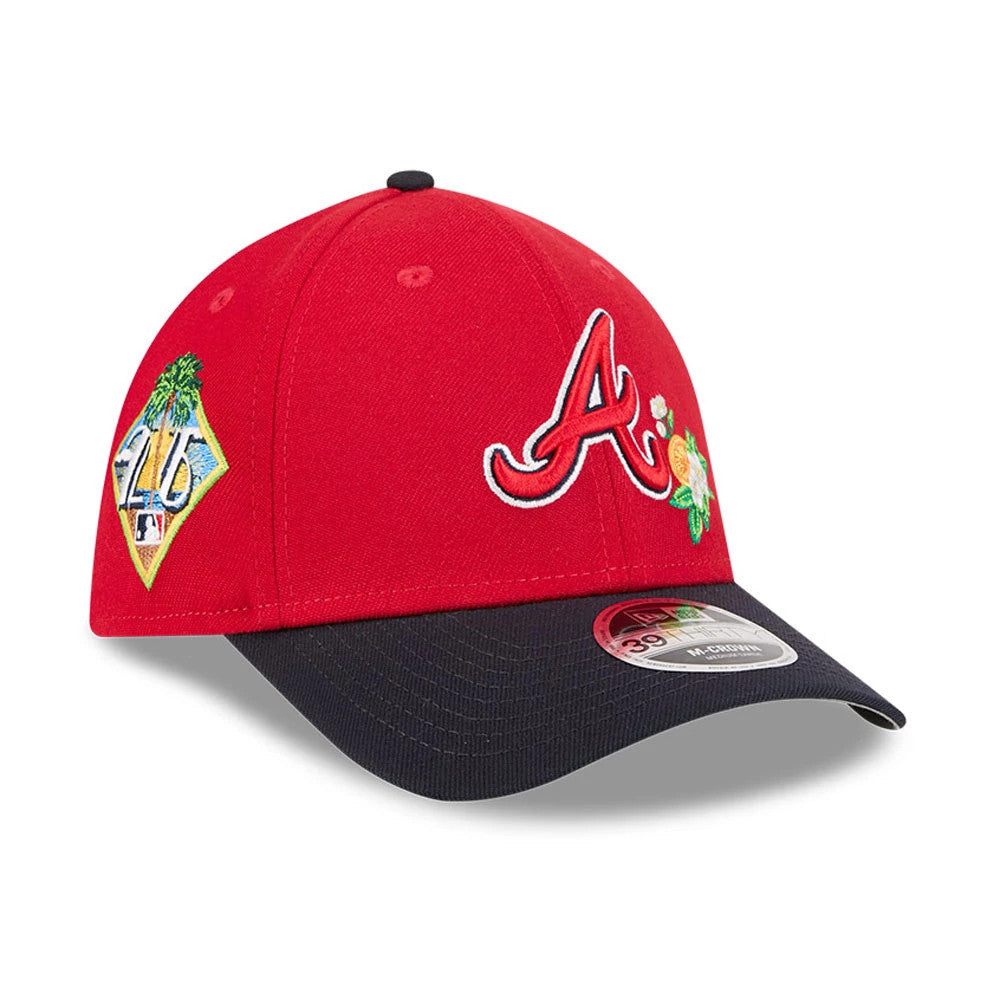 Atlanta Braves MLB Spring Training 2026 Red New Era 39THIRTY M-Crown Stretch Fit Cap, three-quarter view showing the raised white-outlined A logo on the front panel, side patch, black curved visor and 39THIRTY size sticker.