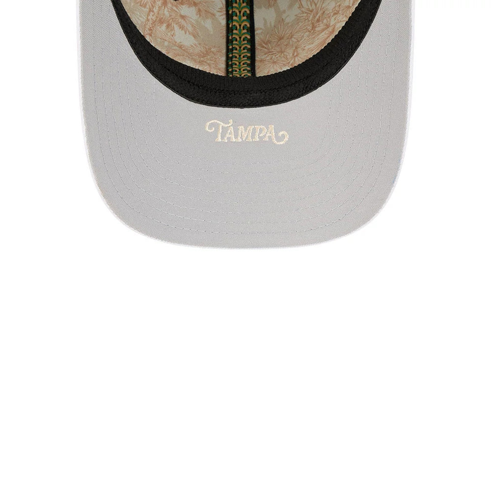Yankees MLB Spring Training 2026 Navy New Era 39THIRTY M-Crown Stretch Fit Cap, inside view showing the tropical patterned taping and tan sweatband with Tampa in cream embroidery on the grey undervisor.