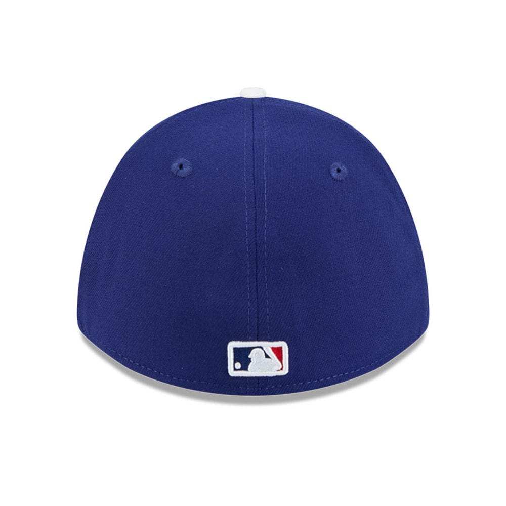 LA Dodgers MLB Spring Training 2026 Blue New Era 39THIRTY M-Crown Stretch Fit Cap, rear view showing the white embroidered MLB Batterman logo at the centre of the back panels on a structured blue crown.