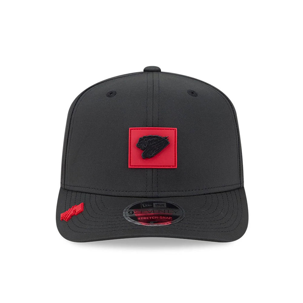 Fresno Grizzlies MiLB Clubhouse Black New Era 9SEVENTY Stretch Snap Adjustable Cap, front view showing black team logo on a red patch on the front panel, black visor with a 9SEVENTY size sticker, and a red accent on the left edge.