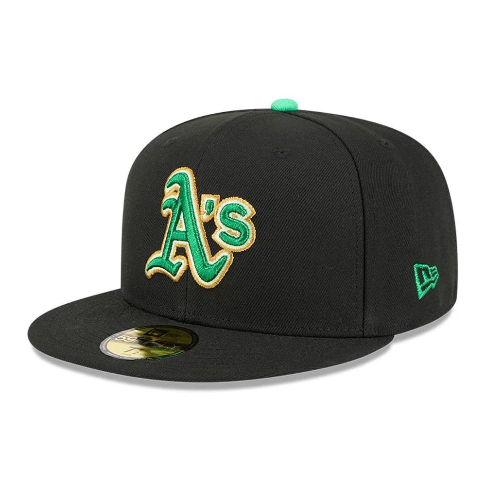 Athletics MLB Saint Patrick's Day Black New Era 59FIFTY Fitted Cap, three-quarter view showing the green and gold embroidered A’s logo on the front panel, a green top button, and a gold 59FIFTY size sticker on the black flat visor.