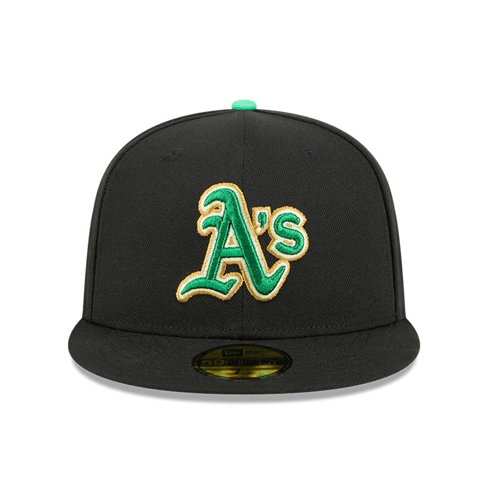 Athletics MLB Saint Patrick's Day Black New Era 59FIFTY Fitted Cap, front view showing a green and gold embroidered A’s logo on the front panel, black flat visor with gold 59FIFTY size sticker and a green top button.