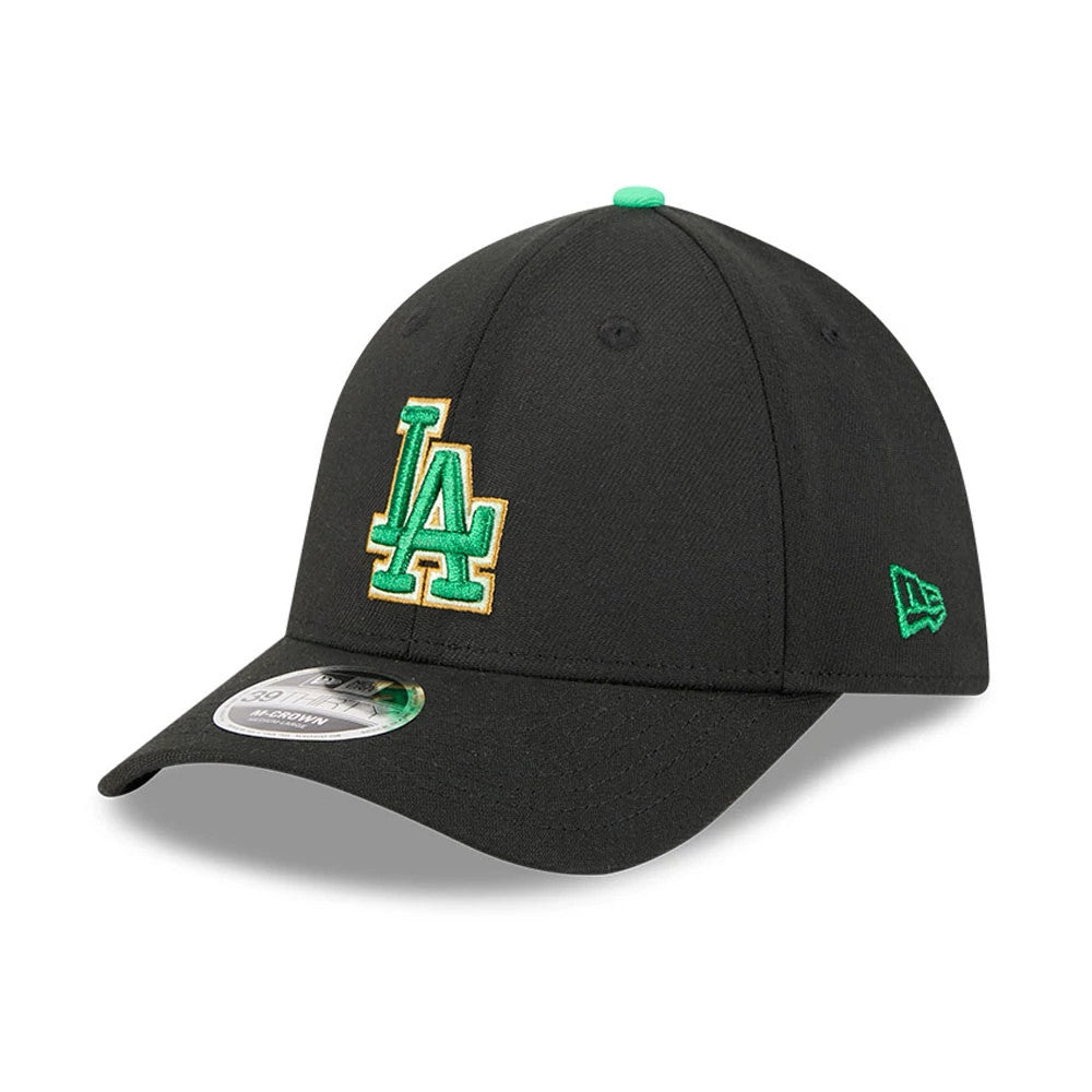 Dodgers MLB Saint Patrick's Day Black New Era 39THIRTY M-Crown A-Frame Stretch Fit Cap, three-quarter view showing a green LA logo outlined in gold on the front panel, green New Era flag on the left side.