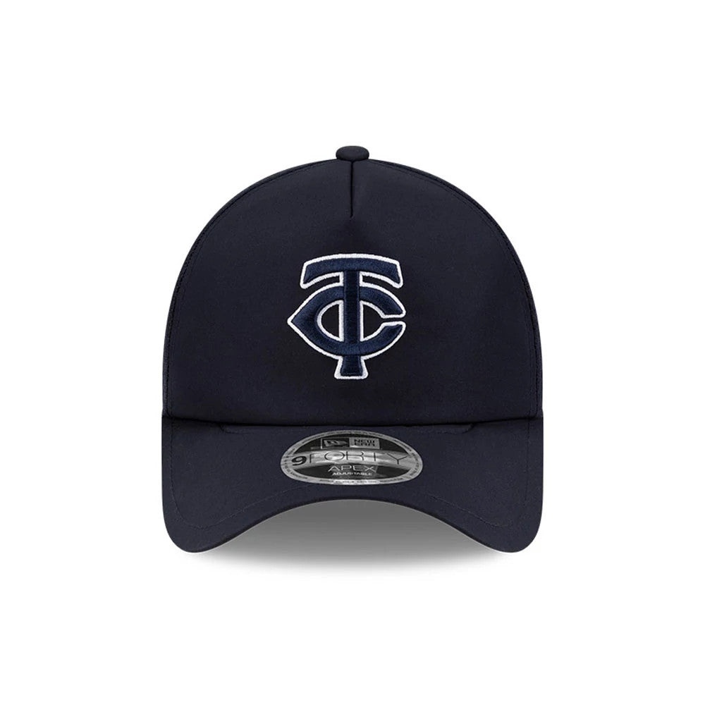 Minnesota Twins MLB Batting Practice 2026 Navy New Era 9FORTY Apex Adjustable Cap, front view showing the white and navy raised embroidered TC logo on the structured crown, with a 9FORTY size sticker on the curved visor.