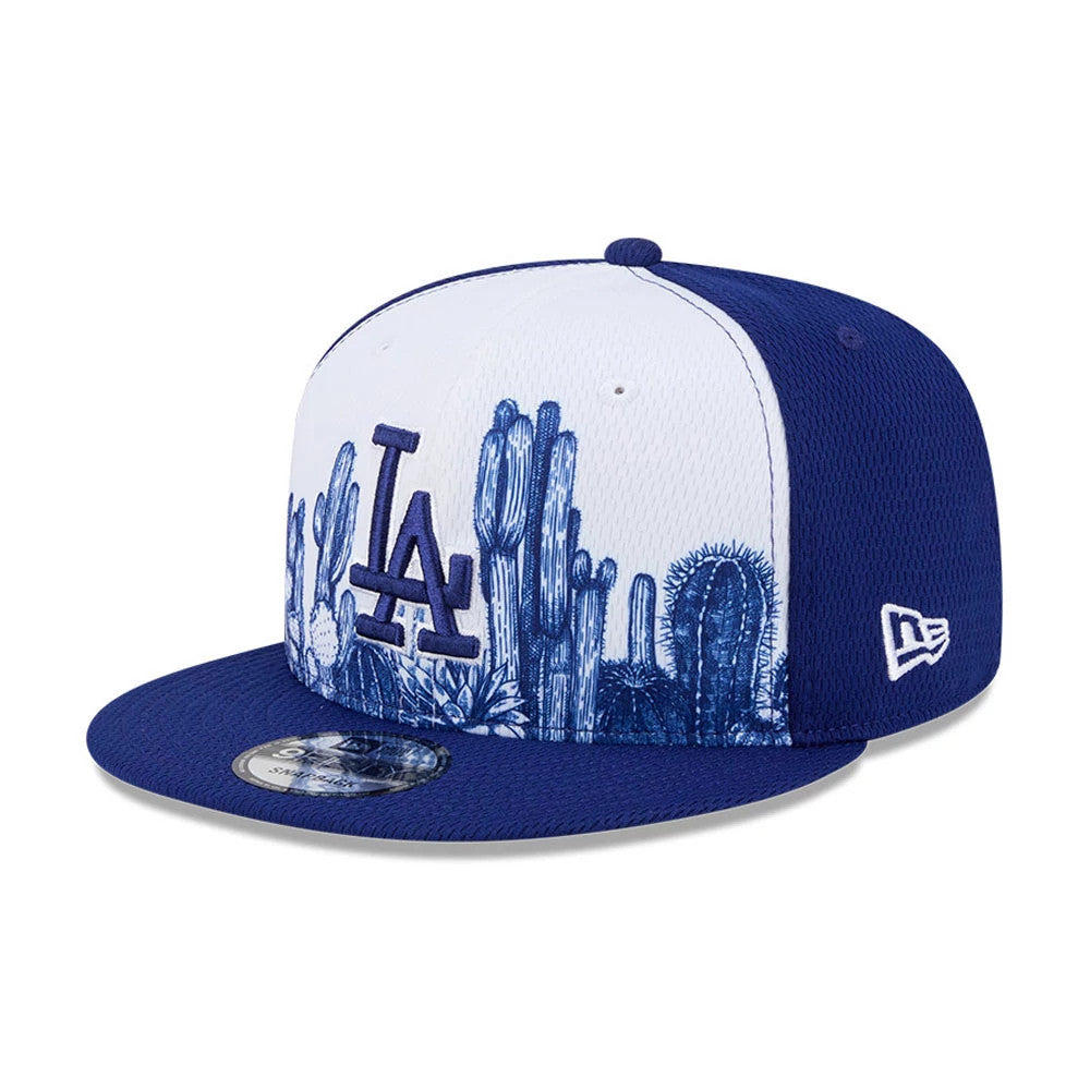 Pictured is this MLB Grow LA Dodgers 9FIFTY Snapback cap in dark blue. 1