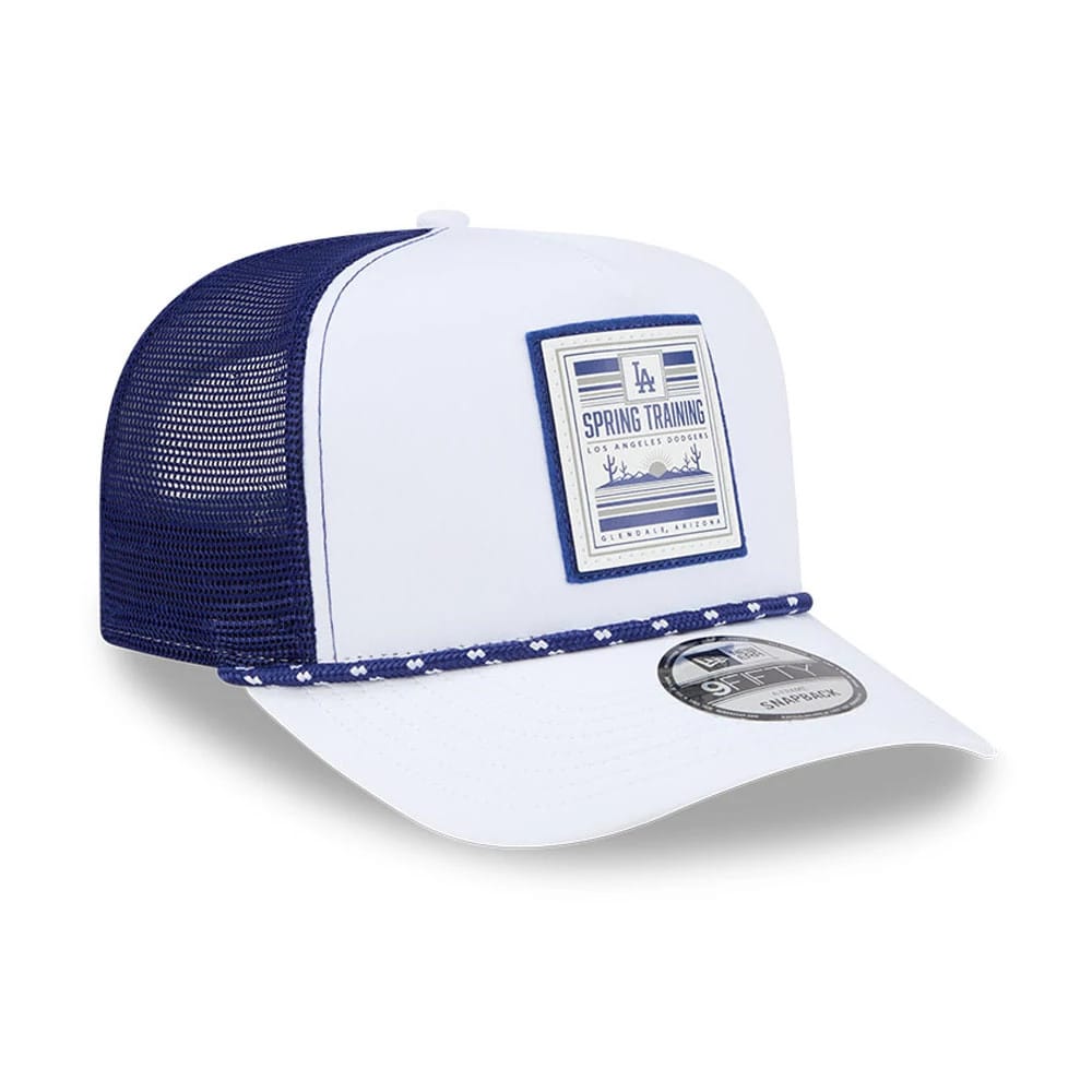 LA Dodgers MLB Lines White New Era 9FIFTY A-Frame Snapback Adjustable Cap, three-quarter view showing a blue Spring Training patch on the structured white front panel, navy mesh rear, matching braid above the white visor and 9FIFTY size sticker.