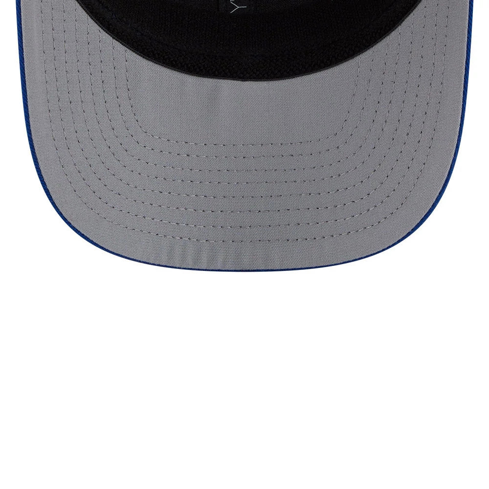 Kansas City Royals MLB Patch Blue New Era 9SEVENTY Stretch Snap Adjustable Cap, inside view showing the black sweatband and contrasting grey undervisor with detailed stitching and the blue visor edge.