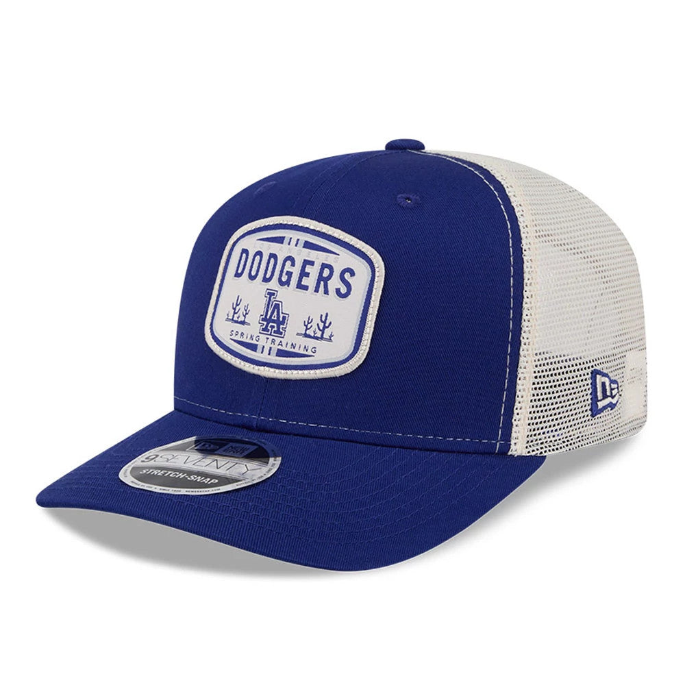 LA Dodgers MLB Patch Dark Blue New Era 9SEVENTY Stretch Snap Adjustable Cap, three-quarter view showing a large embroidered Dodgers patch on the front panel, white mesh back, grey visor, and 9SEVENTY size sticker.