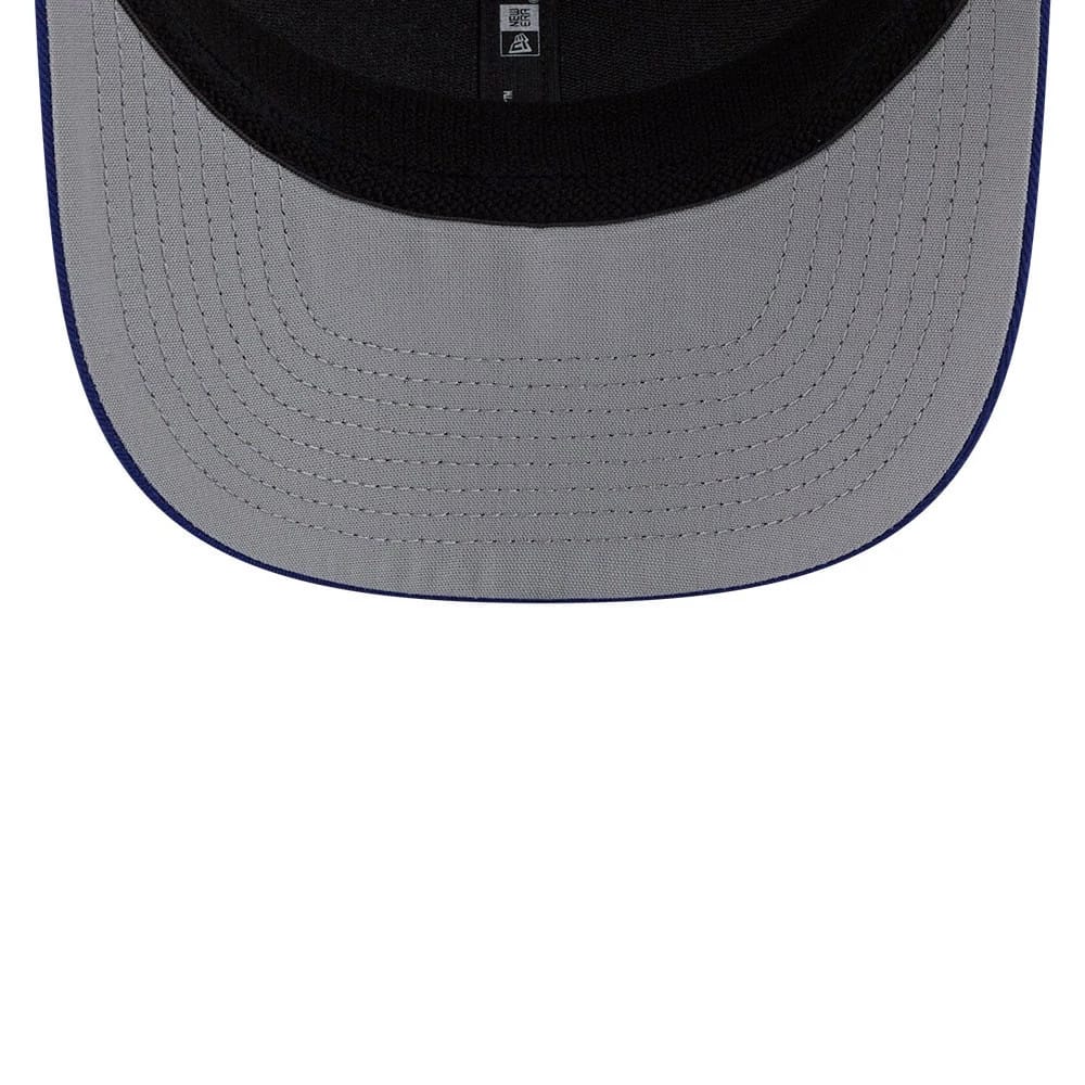 Pictured is this MLB Patch LA Dodgers 9SEVENTY Stretch Snap cap in dark blue. 2