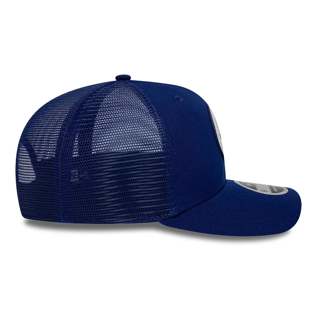 LA Dodgers MLB Circles Dark Blue New Era 9SEVENTY Stretch Snap Adjustable Cap, side view showing dark blue mesh back panels, a curved visor, and the New Era flag logo embroidered on the left side.