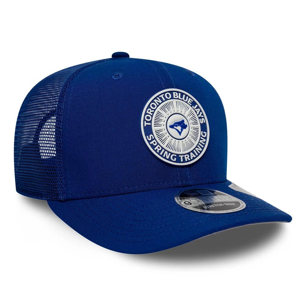 Toronto Blue Jays MLB Circles Blue New Era 9SEVENTY Stretch Snap Adjustable Cap, three-quarter view showing a blue and white embroidered front patch with the team name and logo, curved blue visor, and grey 9SEVENTY size sticker.