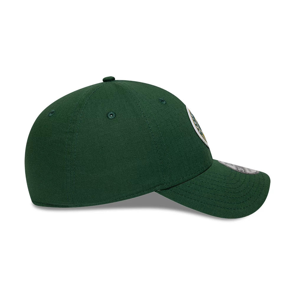 Athletics MLB Ripstop Dark Green New Era 39THIRTY Stretch Fit Cap, side view showing the green New Era flag logo on the left side, a curved visor, and a structured crown with matching embroidered eyelets.