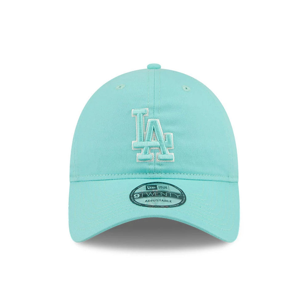 LA Dodgers MLB Colours Turquoise New Era 9TWENTY Adjustable Cap, front view showing the white embroidered LA logo on the structured turquoise crown with matching turquoise visor and 9TWENTY size sticker.