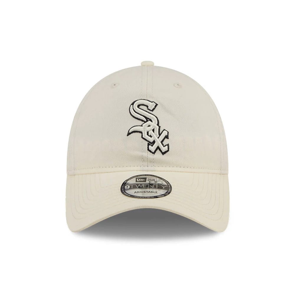 Chicago White Sox MLB Colours White New Era 9TWENTY Adjustable Cap, front view showing the black and white embroidered White Sox logo on the centre of the unstructured crown, with a curved visor and a 9TWENTY size sticker.