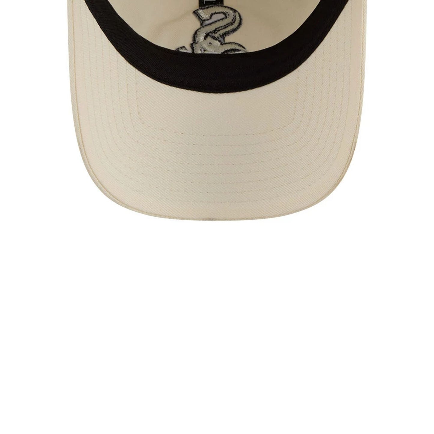 Chicago White Sox MLB Colours White New Era 9TWENTY Adjustable Cap, inside view showing the black sweatband around the edge of the white undervisor and the embroidered team logo on the fabric lining.