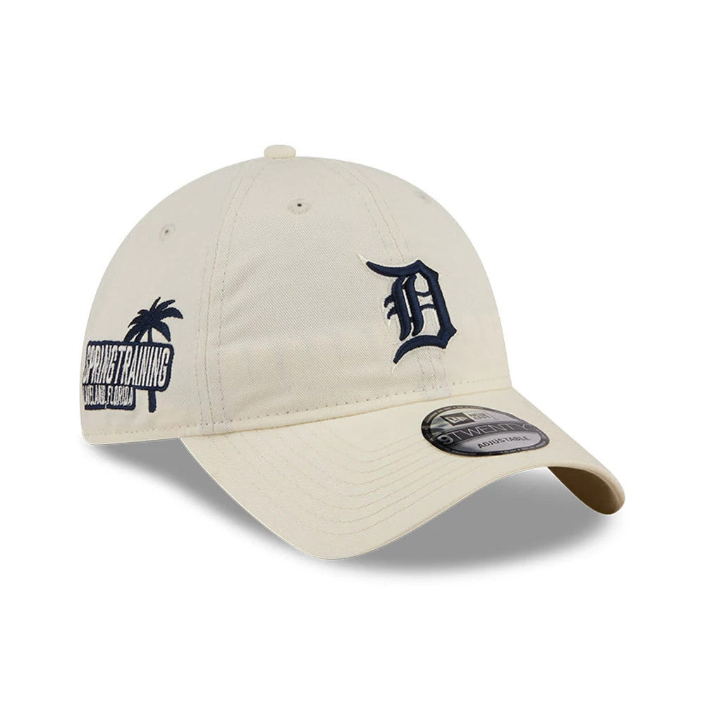 Detroit Tigers MLB Colours White New Era 9TWENTY Adjustable Cap, three-quarter view showing the navy embroidered Detroit D logo on the front panel, palm tree and spring training patch on the side, and 9TWENTY size sticker on the curved visor.