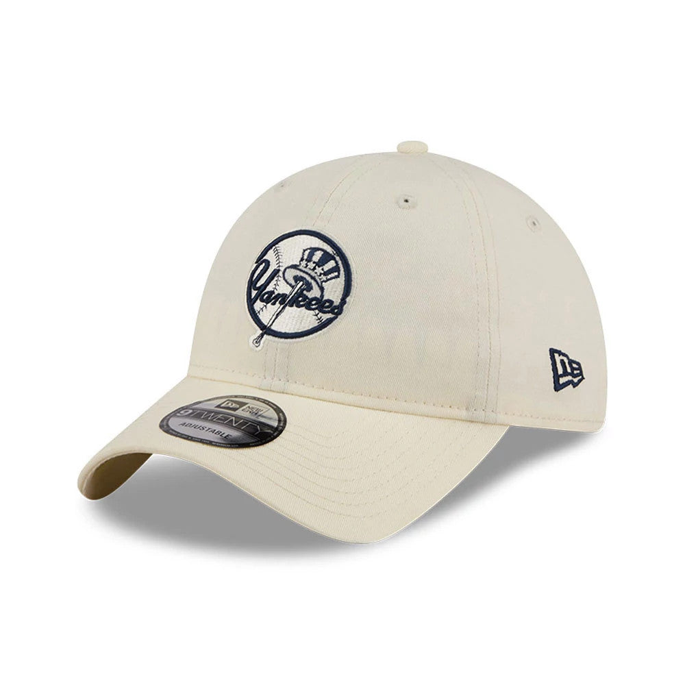 New York Yankees MLB Colours White New Era 9TWENTY Adjustable Cap, three-quarter view showing the navy embroidered Yankees logo on the front panel, curved white visor, and New Era flag logo on the left side.